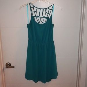Green strappy back dress